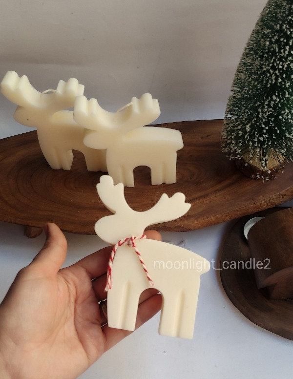 شمع گوزن تخت در طرفدار برای کریسمس و سال نو