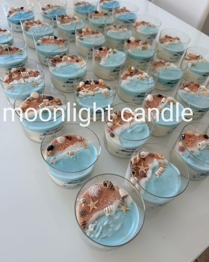 شات شمع شیشه ای دریایی moonlight با تزیین صدف سایز متوسط